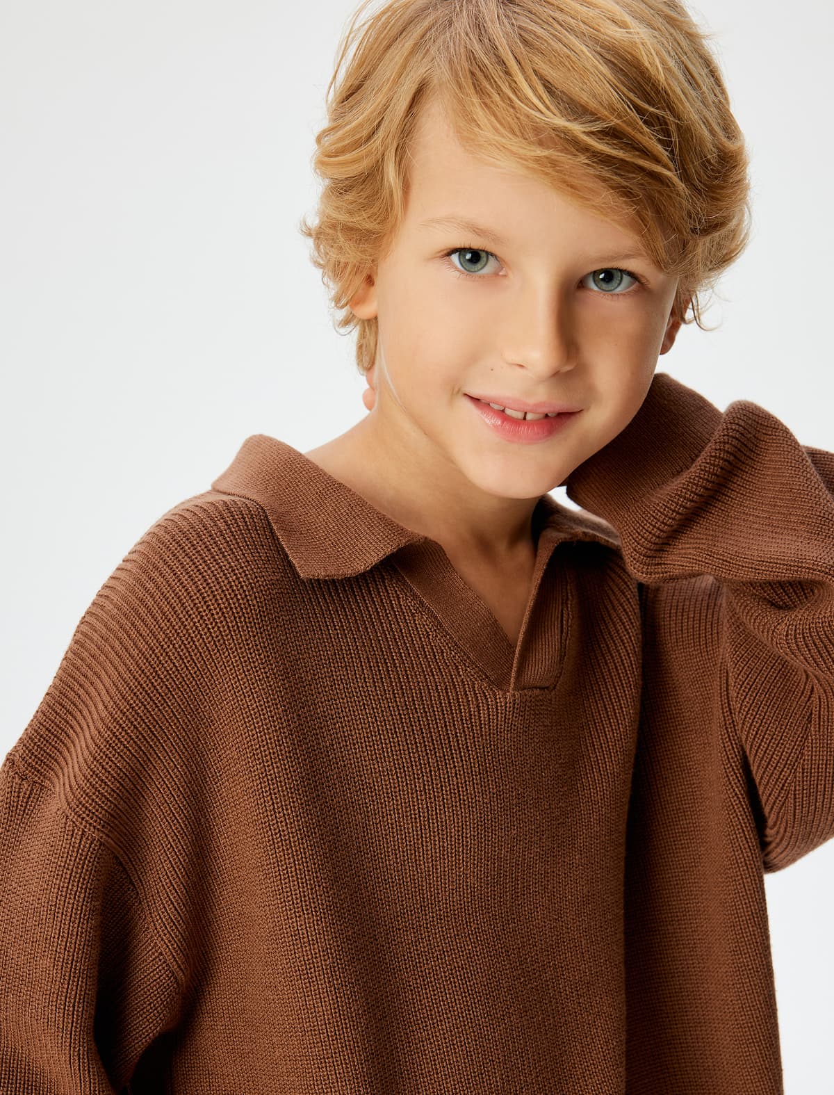 SWEATERS